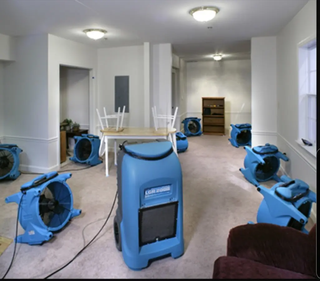 Air movers and dehumidifier setup for Water Extraction & Removal in Carroll